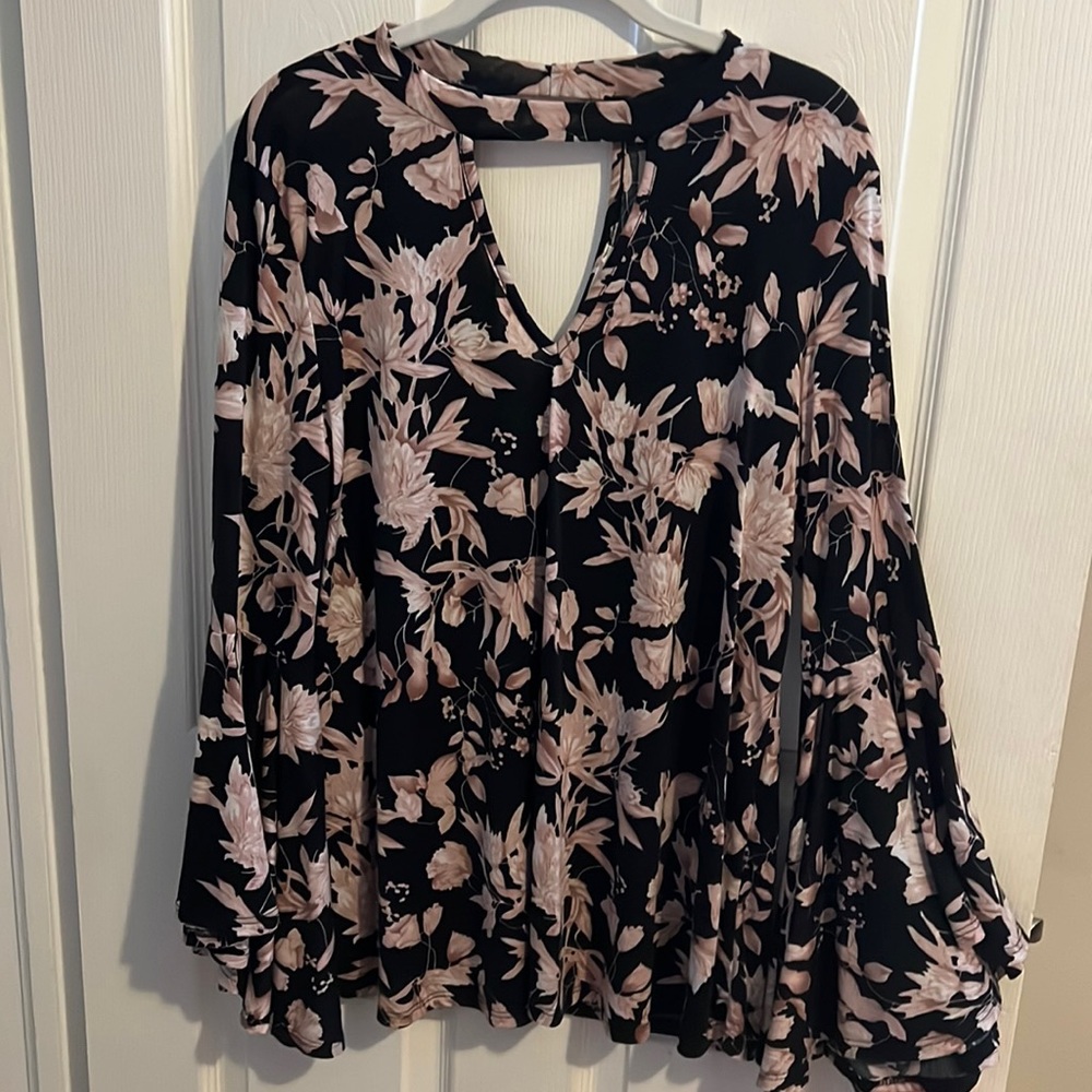 Brand new with tags, Large top from a local New Orleans boutique.